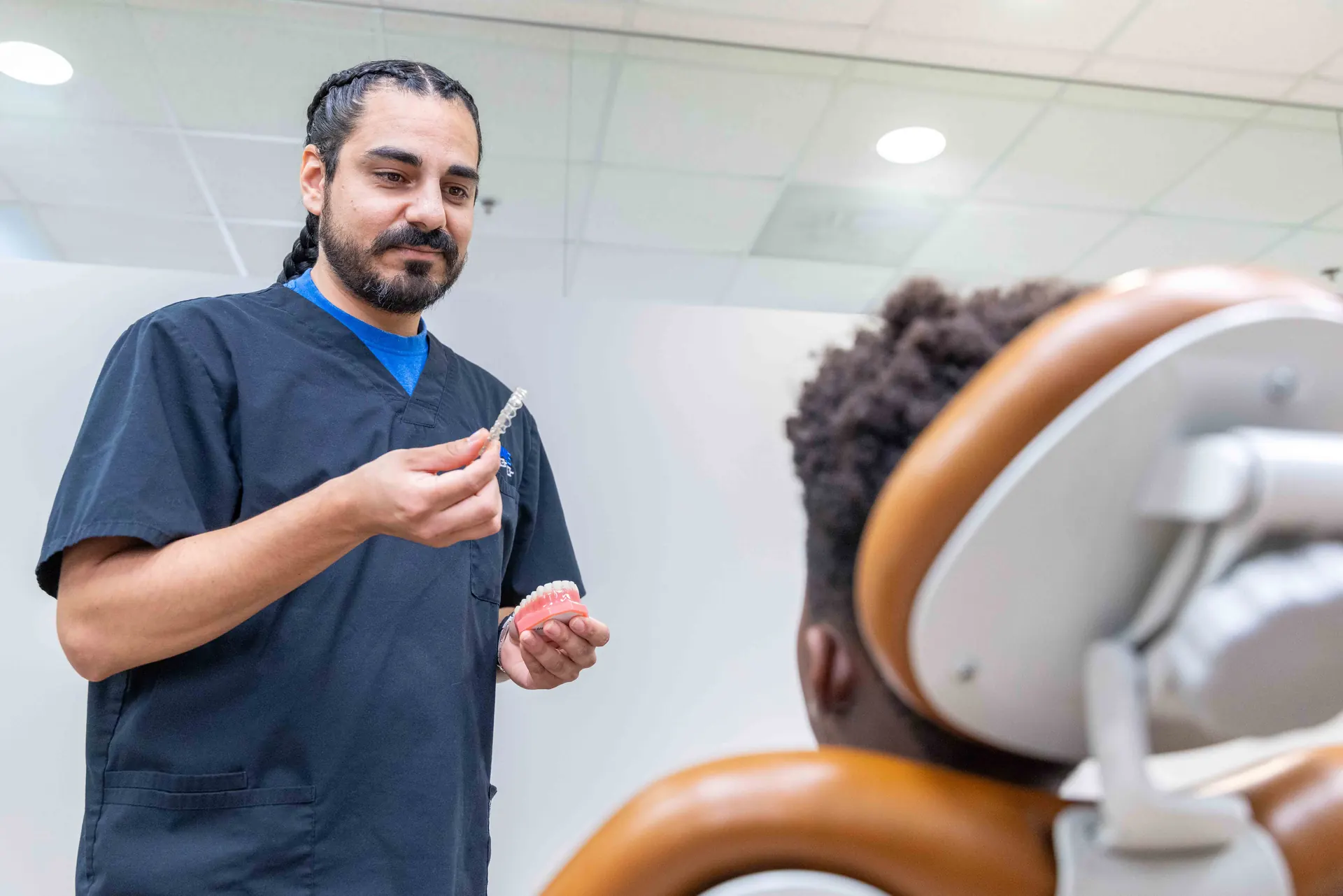 A Bowie Braces clinician explaining a treatment plan